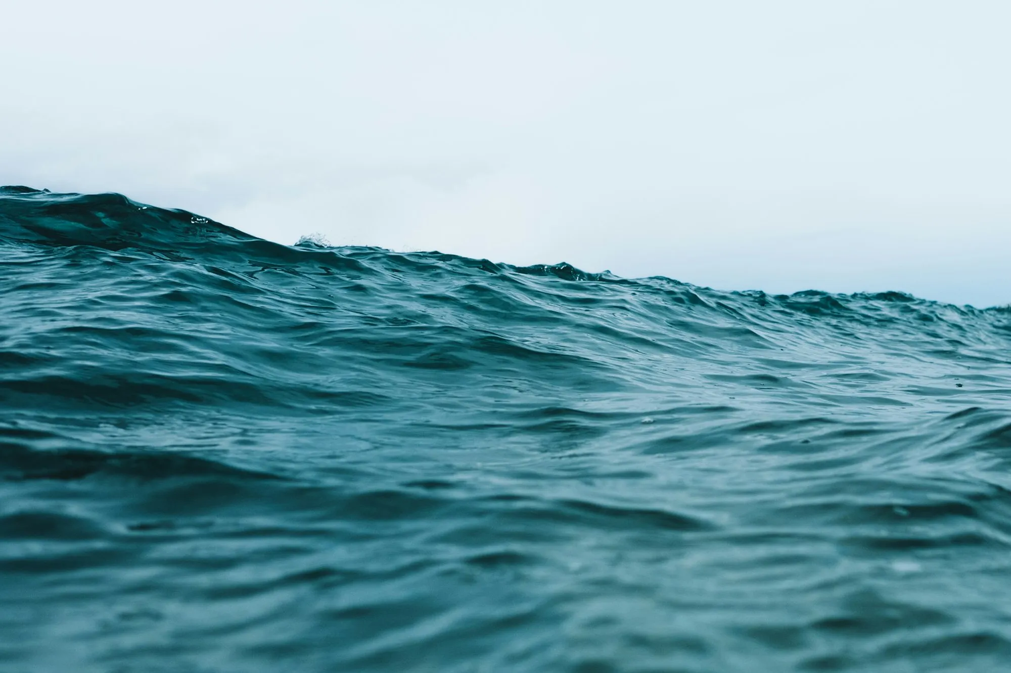 Deep teal Atlantic water rippling off the coast of Taghazout